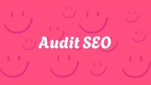 audit seo sur fond rose avec des smileys
